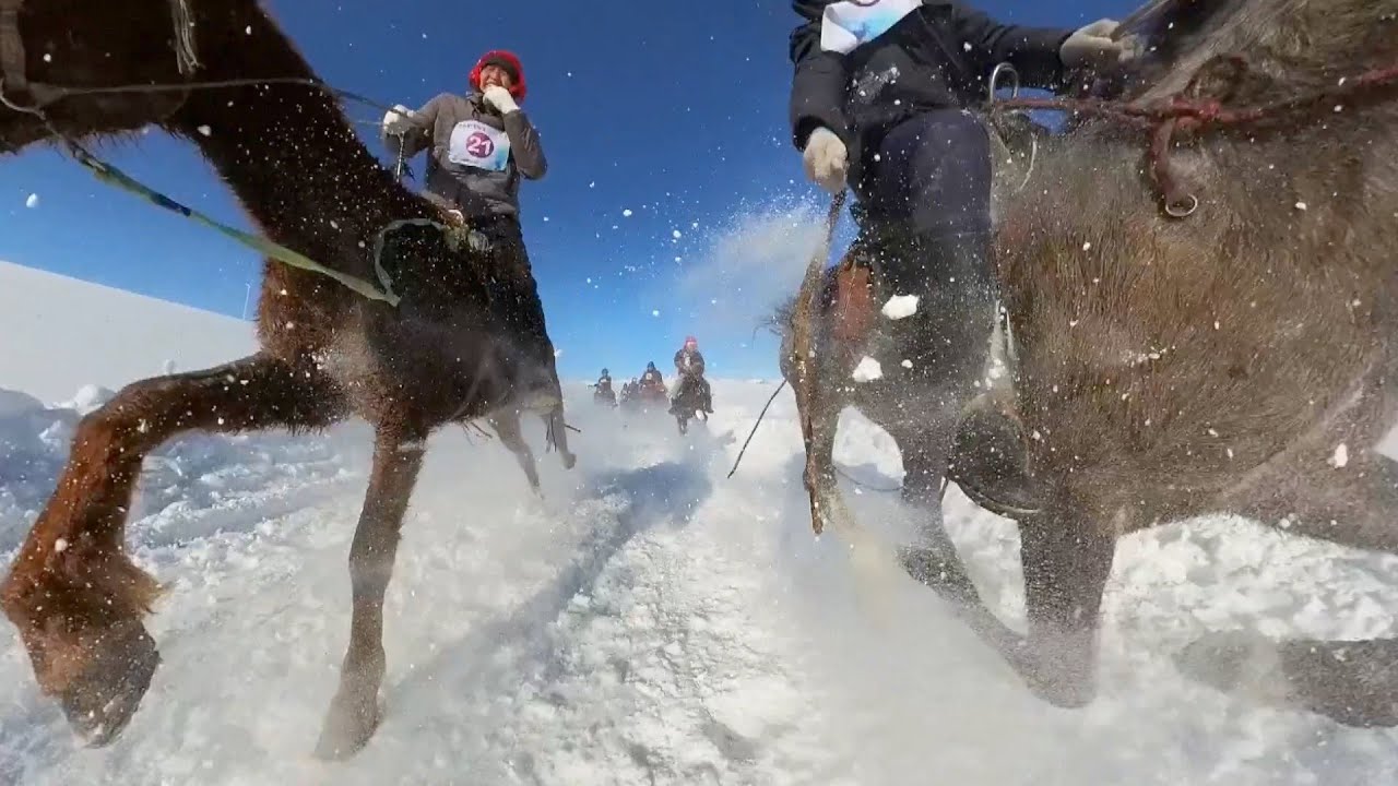 Xinjiang herdsmen gallop across snowy fields to celebrate spring festival 10