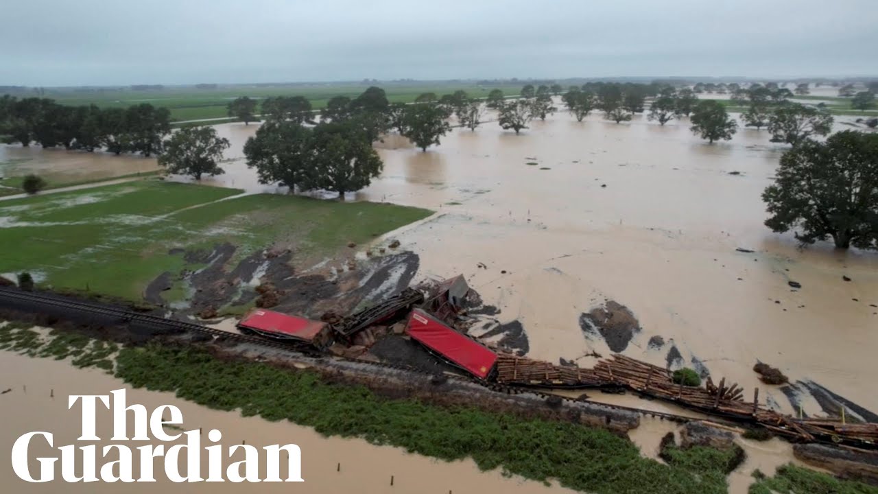 New zealand floods: drone footage shows derailed train and landslides 13