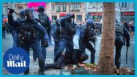 France protests: french riot police attack protesters with batons amid pension reform announcement 9