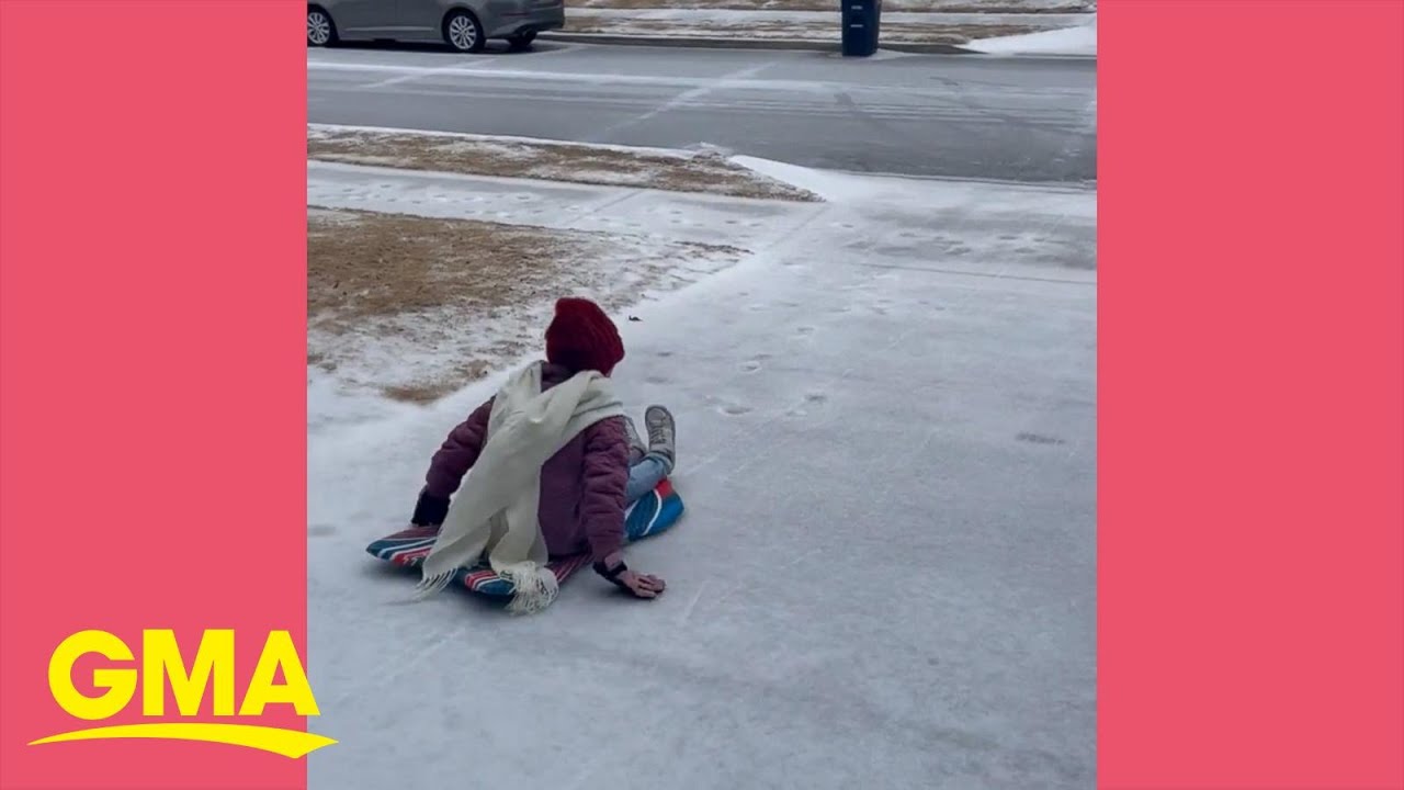 Young girls turn icy driveway into fun sledding runway 4